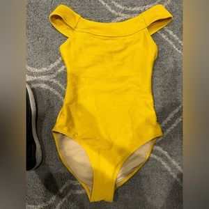 Women’s one piece old navy yellow swimsuit size XS.